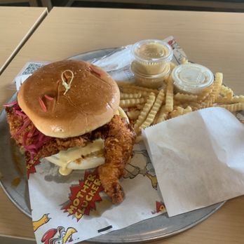 Mother Clucker - a chicken sandwich and french fries - Food Delivery Services Near Me - Rancho Cucamonga, California Mother Clucker - a chicken sandwich and french fries - Food Delivery Services Near Me - Rancho Cucamonga, California