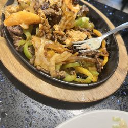 Molcajetes Restaurant - Fajitas that we had already dug into