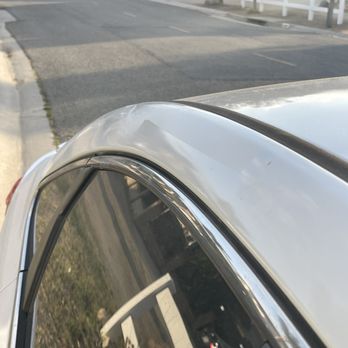 Prestige Auto Reconditioning - Over sprayed on door that didn't need paint - Mobile Dent Repair Near Me