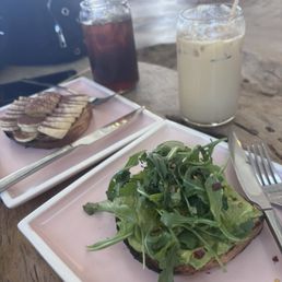 Iced vanilla latte, iced Captain's blend, avocado toast, banana and peanut butter toast