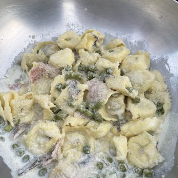 Osteria Maracuja - Tortellini with peas, ham, mushrooms in a cream sauce. - Italian Near Me - Rome, RM Osteria Maracuja - Tortellini with peas, ham, mushrooms in a cream sauce. - Italian Near Me - Rome, RM