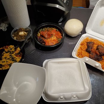 Penksaroma - From left to right: elegusi, ayamase, riro, pounded yam and jollof in the box. Yum! - Caterers Near Me - Newark, New Jersey