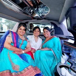 Speedy Wiz Transport - Bridal party in one of our limos. Photo courtesy of Hakim's Studio.