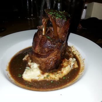 Broken Bit Steakhouse - Braised Pork Shank. Melts in your mouth like butter. - Steakhouses Near Me - Quartz Hill, California Broken Bit Steakhouse - Braised Pork Shank. Melts in your mouth like butter. - Steakhouses Near Me - Quartz Hill, California