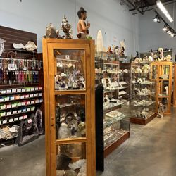 The Rock Shop - Rows of cabinets filled with gems, jewelry, and more