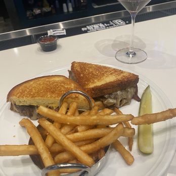 Michael's Cafe White Marsh - Short rib filled cheese with bacon and sautéed onions. - Bars Near Me - Middle River, Maryland Michael's Cafe White Marsh - Short rib filled cheese with bacon and sautéed onions. - Bars Near Me - Middle River, Maryland