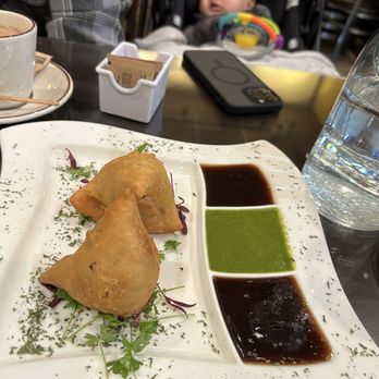 Tandoori Flames - Samosa with the tamarind and chutney sauces - Indian Near Me - Morgan Hill, California Tandoori Flames - Samosa with the tamarind and chutney sauces - Indian Near Me - Morgan Hill, California