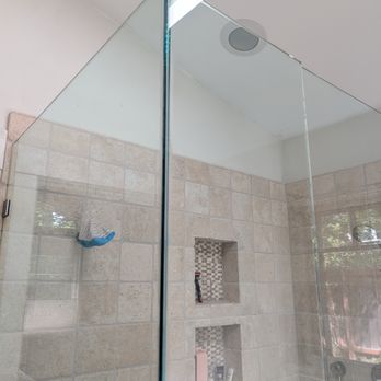 Bella’s Glass - No glass-to-glass hinges or clamps securing two adjacent frameless pieces of glass. - Glass & Mirrors Near Me Bella’s Glass - No glass-to-glass hinges or clamps securing two adjacent frameless pieces of glass. - Glass & Mirrors Near Me