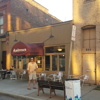 Andrews On the Corner - View of the famous 'Andrews on the corner' pictured here and a fellow local enjoying a brew outside. - New American Near Me - Detroit, Michigan