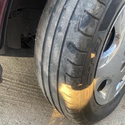 Old striped tire, coated so you won't see the inside part of the tire.