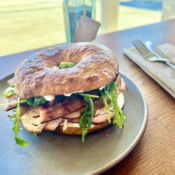 Baker and Cook - Turkey Bagel - turkey, bacon, sautéed onions, lemon cream cheese & arugula on a house-made plain bagel - Bakeries Near Me - Sonoma, California