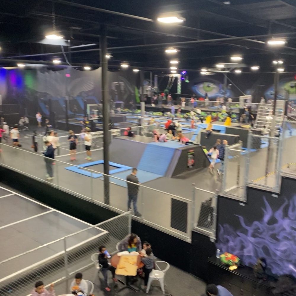 Sky Zone Trampoline Park - Looking down from second floor on a Saturday - Trampoline Parks Near Me - Tukwila, Washington Sky Zone Trampoline Park - Looking down from second floor on a Saturday - Trampoline Parks Near Me - Tukwila, Washington
