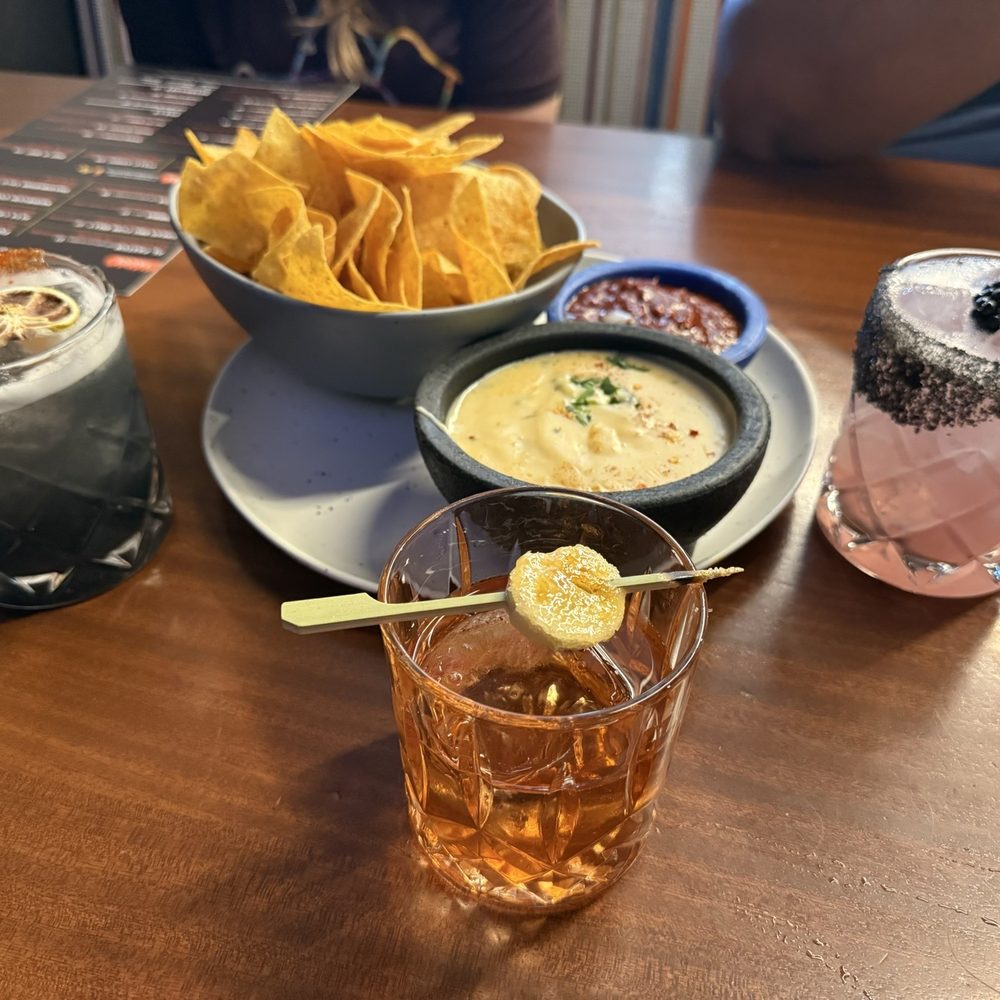 Spitfire Tacos + Tequila - Huckleberry Margarita, Mexico City Margarita, and Strawberry Banana Margarita paired with Tajin covered chips, queso, and salsa. - Mexican Near Me - Eagle, Idaho Spitfire Tacos + Tequila - Huckleberry Margarita, Mexico City Margarita, and Strawberry Banana Margarita paired with Tajin covered chips, queso, and salsa. - Mexican Near Me - Eagle, Idaho