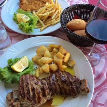 Al Bagolo - Steak with roasted potatoes, Breaded milanesa with fries - Bars Near Me - Venezia, 34 Al Bagolo - Steak with roasted potatoes, Breaded milanesa with fries - Bars Near Me - Venezia, 34