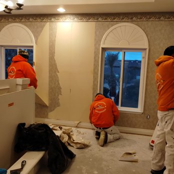 Paint Masters & Moulding - Hard at work removing wall paper. - Painters Near Me - Las Vegas, Nevada