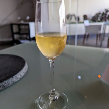 Cocina de Autor - Welcome drink at Cocina de Autor at Grand Velas Riviera Maya. House-infused gin, sparking wine, gold dust. - Signature Cuisine Near Me - Playa del Carmen, ROO