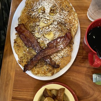Ruby Slipper Marigny - Bananas Foster Pancakes with bacon and breakfast potatoes. - Breakfast & Brunch Near Me - New Orleans, Louisiana Ruby Slipper Marigny - Bananas Foster Pancakes with bacon and breakfast potatoes. - Breakfast & Brunch Near Me - New Orleans, Louisiana