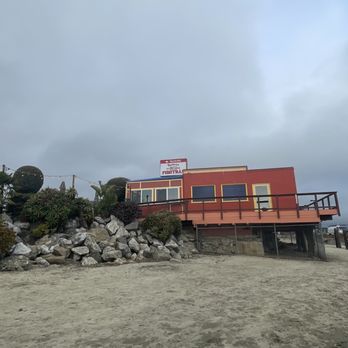 Barbara's Fishtrap - Side of the building from the beach below - Seafood Near Me - Half Moon Bay, California