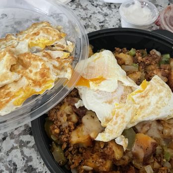 Eggs Up Grill - My "over medium" hard cooked eggs that were remade 3 times and never right. Don't come here unless you like over hard or scrambled eggs. - Breakfast & Brunch Near Me - Leland, North Carolina
