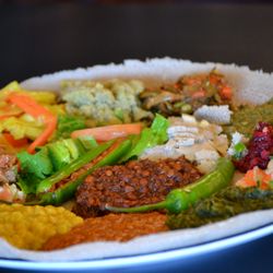 Meda Coffee & Kitchen - Yetsom Beyaynetu is an Ethiopian combination platter composed of a vegan assortment of non-fasting foods and veggies.