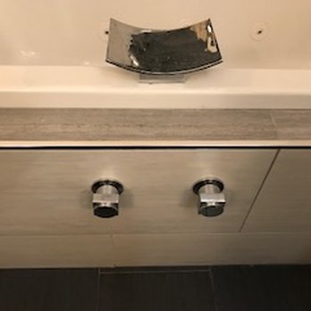 Mike Reed Tile - Mike cut this tile (with the faucet handles) so that a plumber could get to the pipes. He located the same tile at a hardware store for us. - Tiling Near Me - Tarzana, California Mike Reed Tile - Mike cut this tile (with the faucet handles) so that a plumber could get to the pipes. He located the same tile at a hardware store for us. - Tiling Near Me - Tarzana, California