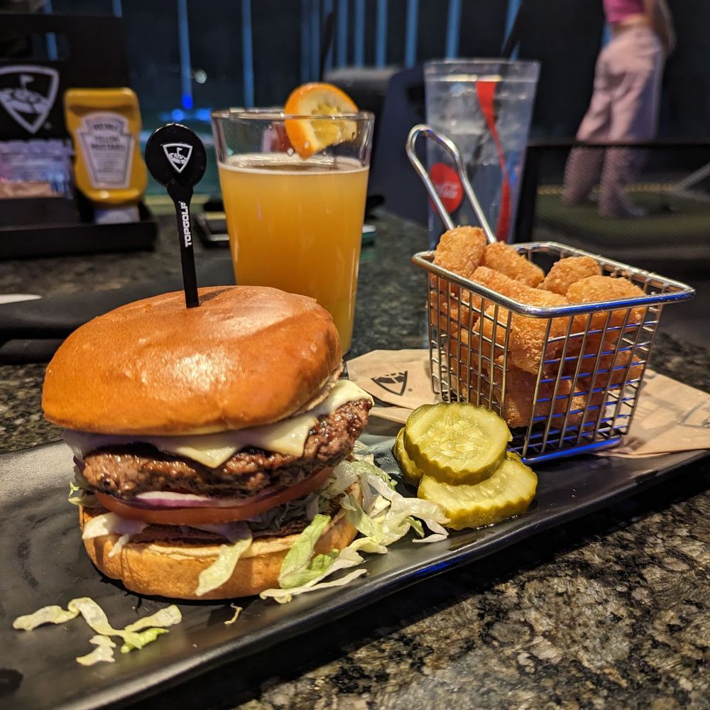 Topgolf - Burger and tater tots. 12 and tasty! - Sports Bars Near Me - Alpharetta, Georgia Topgolf - Burger and tater tots. 12 and tasty! - Sports Bars Near Me - Alpharetta, Georgia