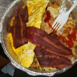 Eggs burned Turkey bacon and potatoes yuck