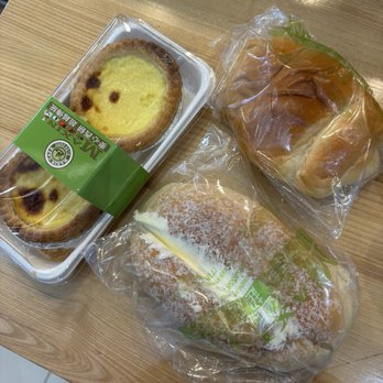 Maxin Bakery - Portuguese custard egg tart, a sweet creamy bun and a savory roast pork bun - Bakeries Near Me - Flushing, New York