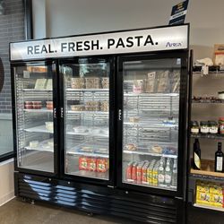 Angelo's Italian Market - Interior - refrigerated retail items including sauces, fresh pasta, drinks, and more