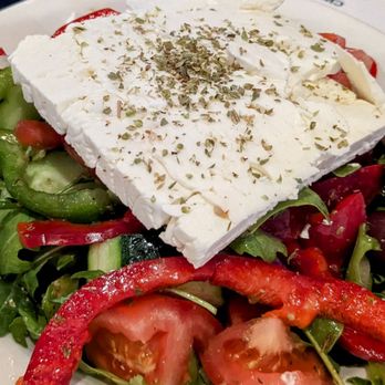 Demitris Taverna - Greek salad (with a hunk of feta cheese on top) - Greek Near Me - Livermore, California Demitris Taverna - Greek salad (with a hunk of feta cheese on top) - Greek Near Me - Livermore, California