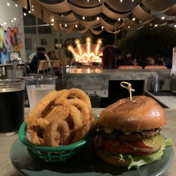 Raleigh's Pub - Burger and onion rings / outer seating - American Near Me - Berkeley, California Raleigh's Pub - Burger and onion rings / outer seating - American Near Me - Berkeley, California