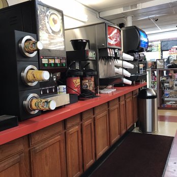 In And Out Market - a counter with coffee machines - Beer, Wine & Spirits Near Me - St Ann, Missouri In And Out Market - a counter with coffee machines - Beer, Wine & Spirits Near Me - St Ann, Missouri