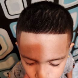 Guys who cuts hair 4th chair down. Do not go to him with children. He has no patience for them and messes up their hair. Guys who cuts hair 4th chair down. Do not go to him with children. He has no patience for them and messes up their hair.