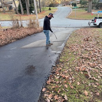 Triad Paving And Roofing - Final application of two layers of material - Roofing Near Me Triad Paving And Roofing - Final application of two layers of material - Roofing Near Me