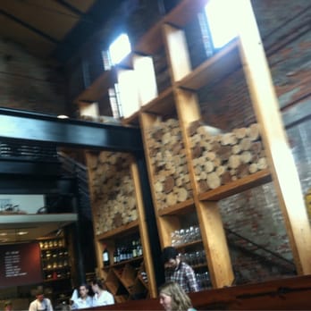 Woodberry Kitchen - Wood wall leading upstairs. - American Near Me - Baltimore, Maryland