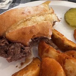 Linney's Pizza - Roast Beef sandwich and Potato Wedges. Delicious!