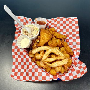 The Hungry Clam - Seafood Combo Basket (Halibut, Shrimp, Squid, Clam Strips, & Oyster) - Seafood Near Me - Brookings, Oregon The Hungry Clam - Seafood Combo Basket (Halibut, Shrimp, Squid, Clam Strips, & Oyster) - Seafood Near Me - Brookings, Oregon