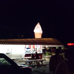 an ice cream shop at night