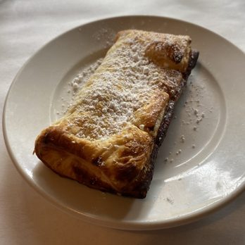 Pizza Art Cafe - a piece of pastry on a plate - Pizza Near Me - Chicago, Illinois Pizza Art Cafe - a piece of pastry on a plate - Pizza Near Me - Chicago, Illinois