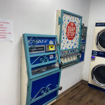 Beachside Del Mar Laundromat - Coin machine + area to buy soap (for $1). Nothing fancy - ur standard detergent. - Laundromat Near Me - Del Mar, California