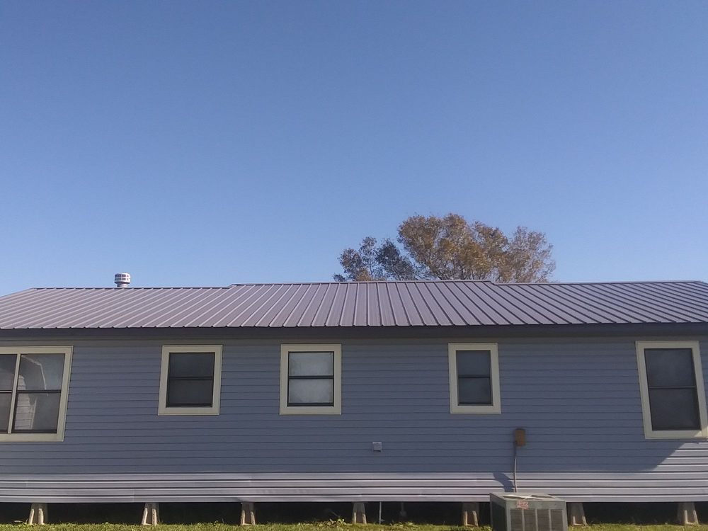 Slide of Bears Cajun Roofing