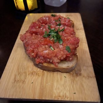 Amada - Delicious, tomato bread, which tastes just like bruschetta - Tapas Bars Near Me - Atlantic City, New Jersey Amada - Delicious, tomato bread, which tastes just like bruschetta - Tapas Bars Near Me - Atlantic City, New Jersey