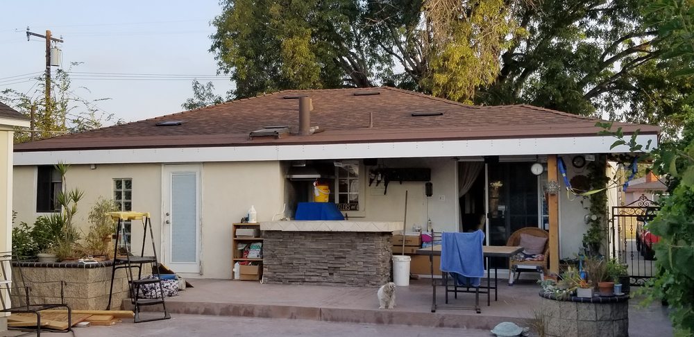 Slide of De Lorenzo's Guaranteed Roofing