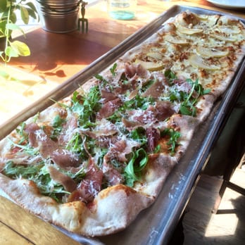 San Daniele- Tomato sauce, mozz, arugula, prosciutto & parmesan. Alla Roba- Mozz, gorgonzola, pear & walnut parmesan, truffle oil, balsamic