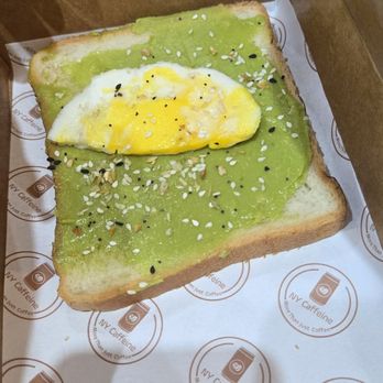 NY Caffeine - sad avocado toast, with half a cold egg that cost $2 extra - Desserts Near Me - Westbury, New York