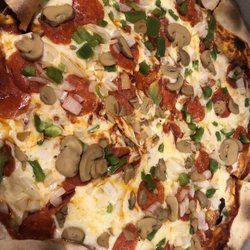 The Thirsty Dawg Taverne - Large pizza - pepperoni, mushrooms ,  green peppers and onions ... Delicious!