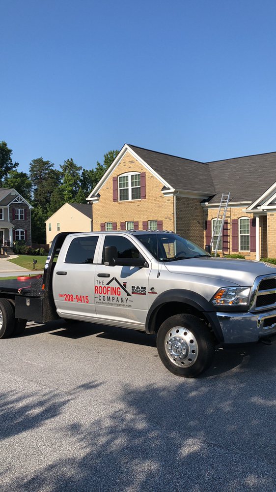 Slide of The Roofing Company