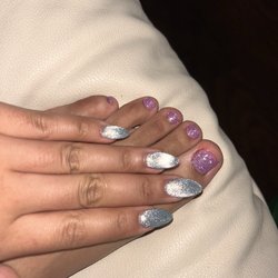 Vivid Nails & Beauty Bar - $40 gel pedicure & $80 full set acrylic nails with cats eye color design (with flash)