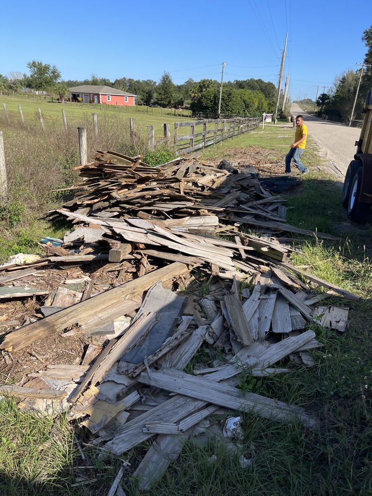 Slide of Big Jon Dumpster Services