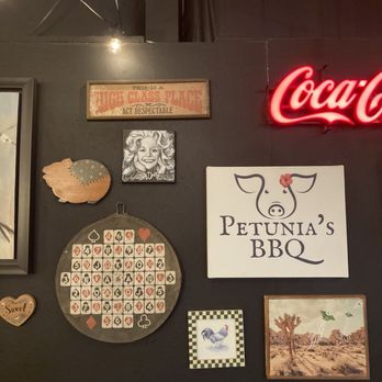 Petunia's BBQ - Fun wall with local artist work....I spy Brenna Bonita Art. - Barbeque Near Me - Purvis, Mississippi Petunia's BBQ - Fun wall with local artist work....I spy Brenna Bonita Art. - Barbeque Near Me - Purvis, Mississippi